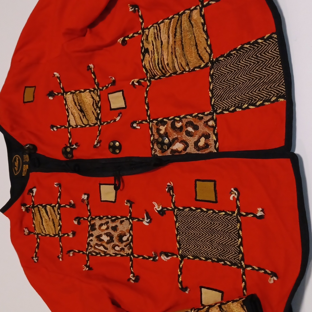 Allure red long sleeve jacket size medium  w/ patches of animal print squares